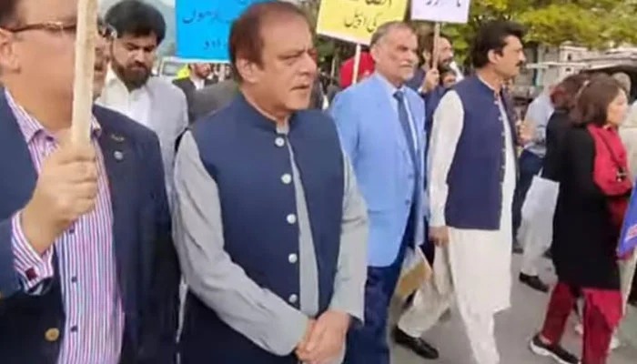 PTI Senators start march from Parliament House